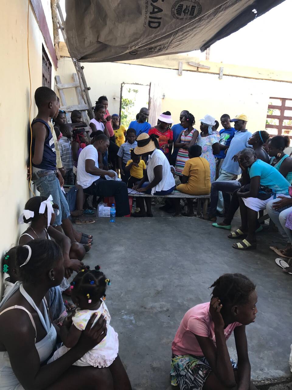 Families gathered to receive aid in Haiti