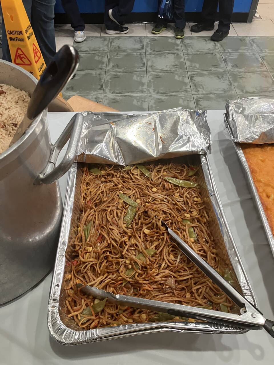 Tray of seasoned lo mein noodles with vegetables